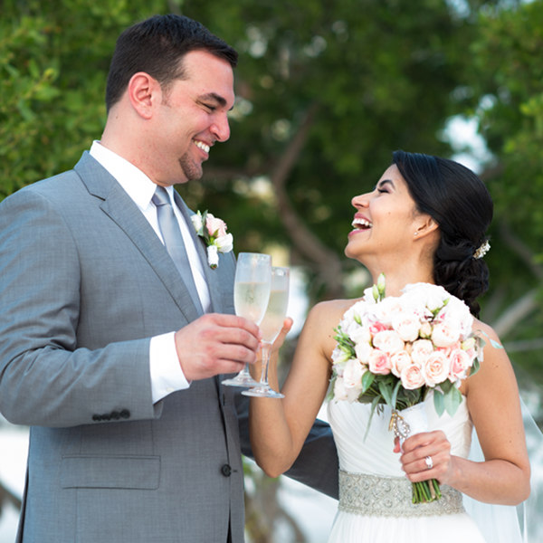 Ritz Carlton wedding with happy couple and champagne toast